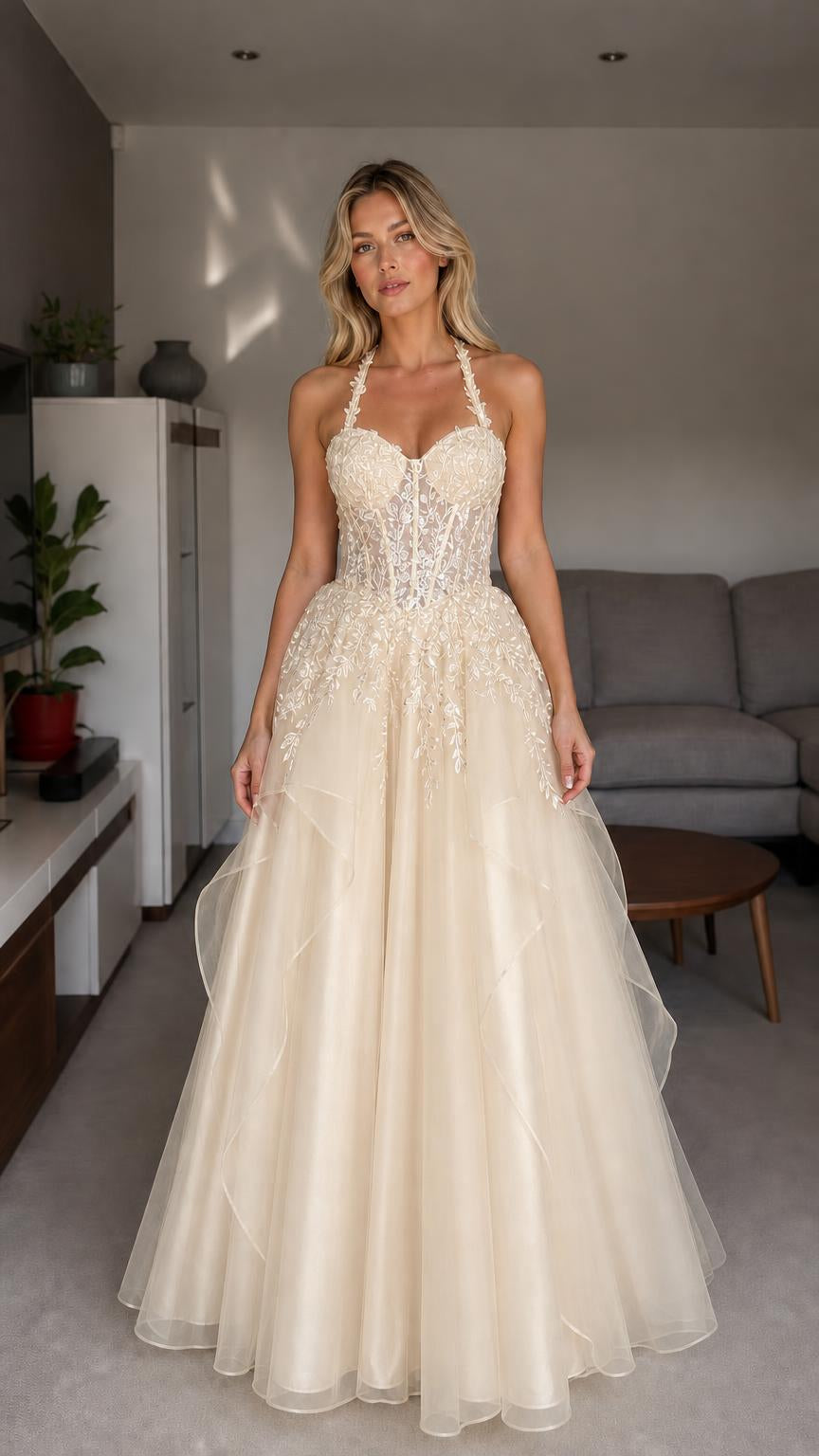 Front view of champagne halter embroidered tulle ball gown