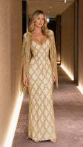 Front view of champagne beaded fringe evening gown
