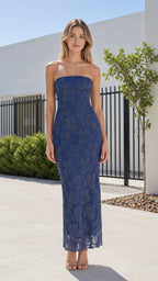 Front view of model wearing navy strapless sequin lace maxi dress