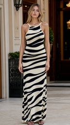 Model wearing White and Black Zebra Print Halter Neck Maxi Dress, front view