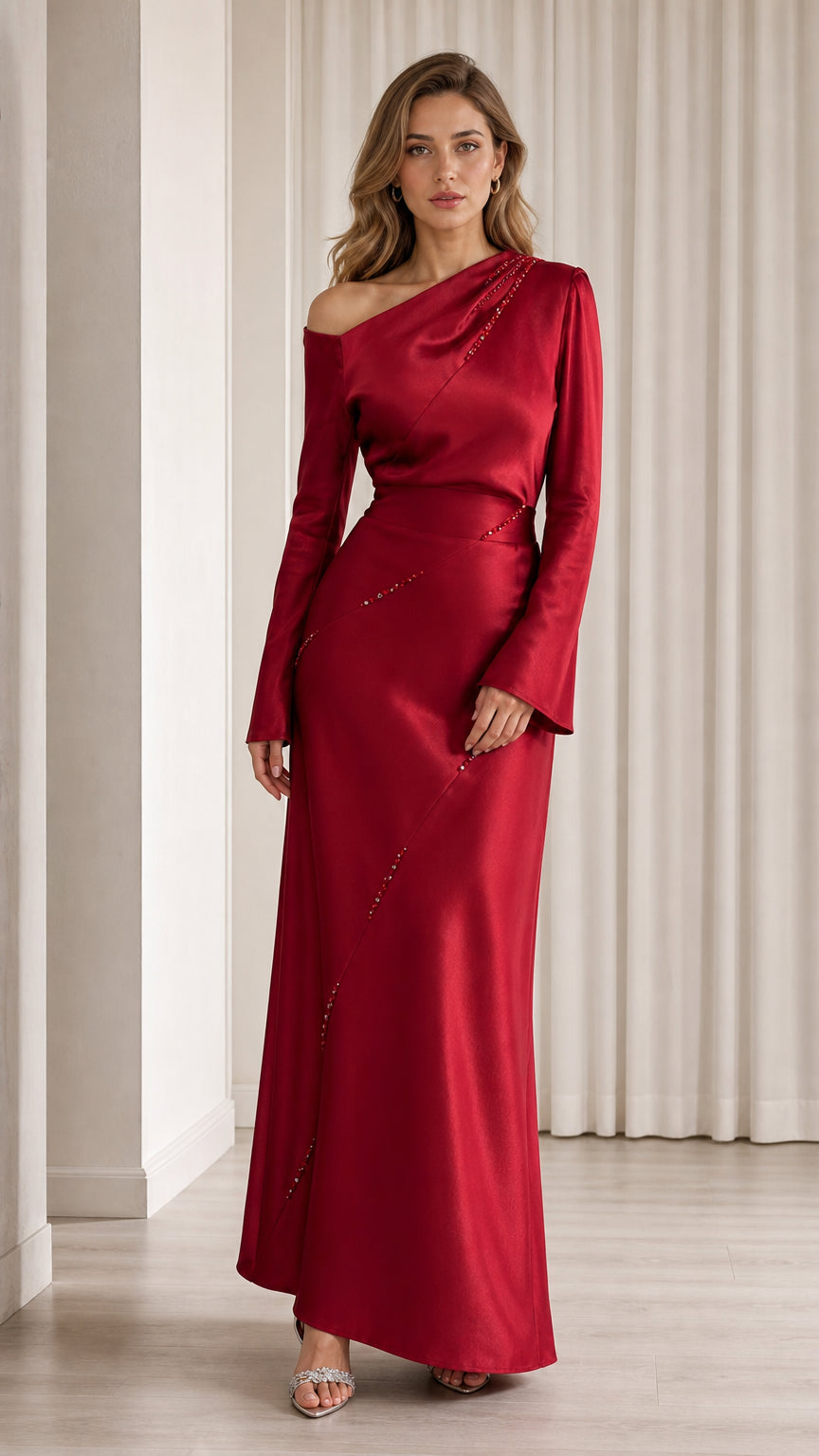 Front view of model wearing red one-shoulder satin evening gown
