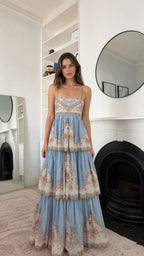 Sky blue floral tiered maxi dress shown from the front