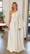 Front view of woman wearing white one-shoulder sequin maxi dress