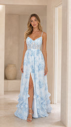 Front view of woman wearing light blue floral corset maxi dress with slit