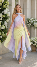 Front view of model wearing multi ombre draped halter maxi dress