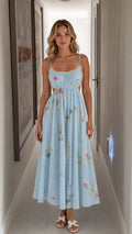 Front view of light blue floral cutout midi dress