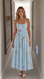 Front view of light blue floral cutout midi dress