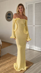 Front view of yellow off-shoulder ruffle knit maxi dress