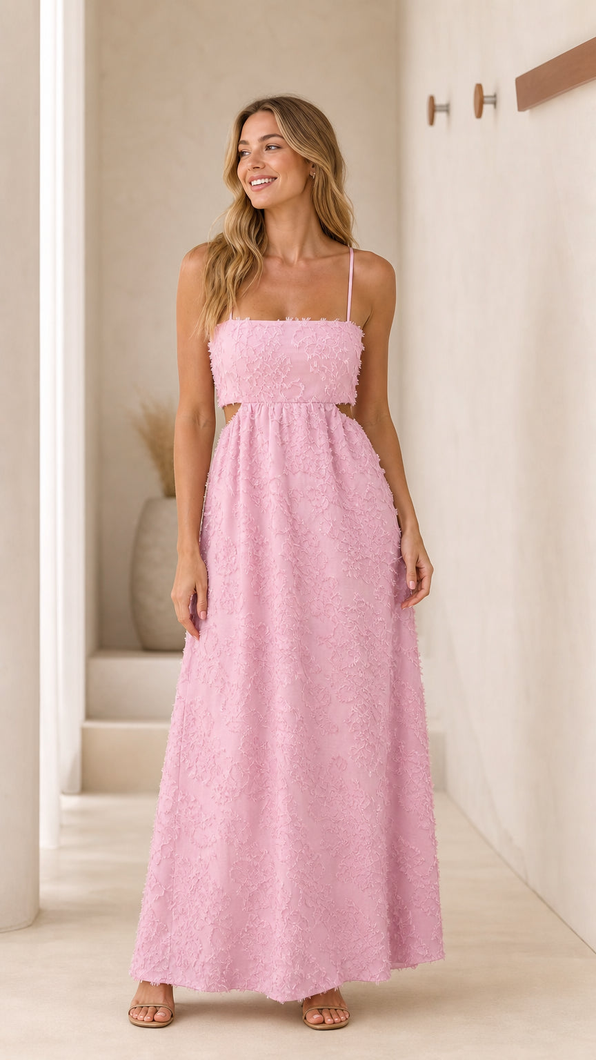 Front view of pink textured cutout maxi dress