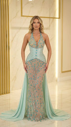 Front view of mint crystal embellished halter mermaid evening gown