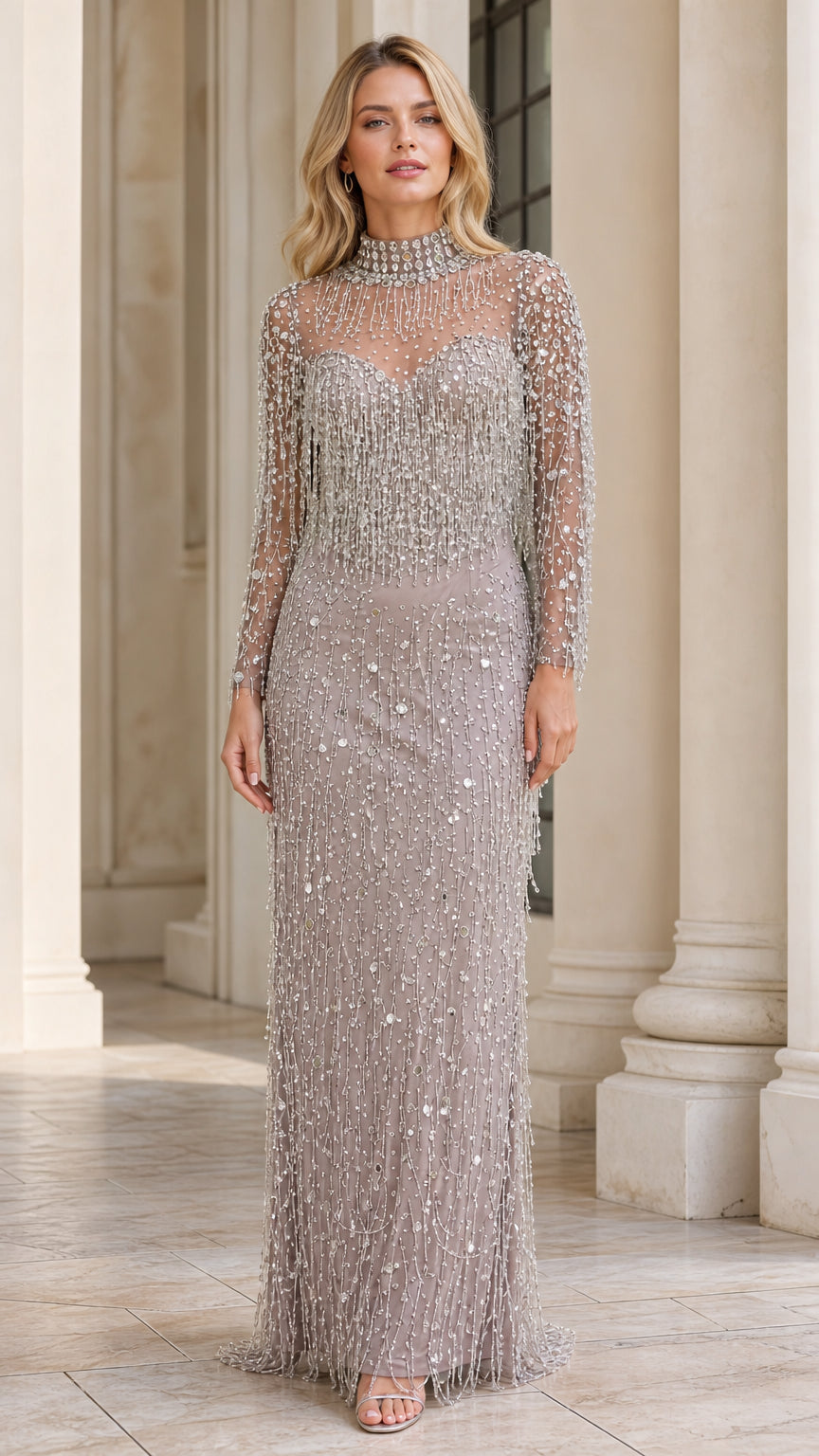 Front view of model wearing silver grey beaded evening gown