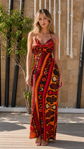 Front view of model wearing Red Multi bohemian geometric halter maxi dress