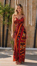 Front view of model wearing Red Multi bohemian geometric halter maxi dress