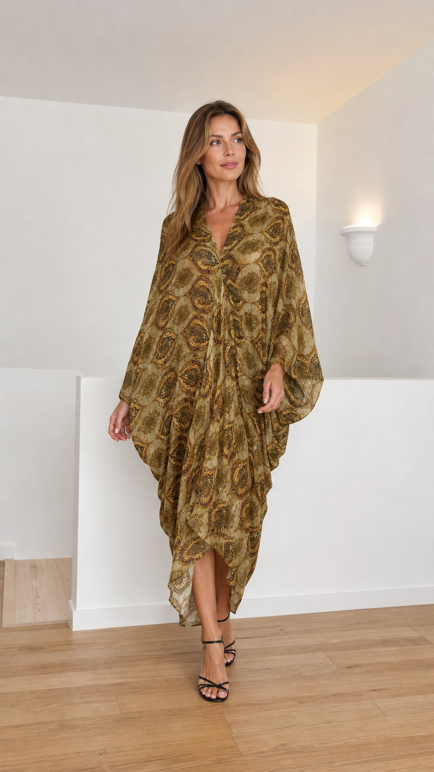 Model wearing olive paisley kaftan dress front view