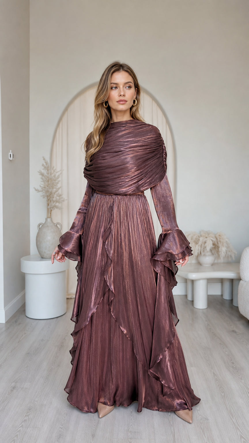 Front view of model wearing metallic brown pleated long sleeve maxi dress
