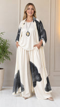 Front view of woman wearing off-white abstract print 3-piece set