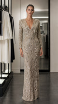 Front view of champagne sequined long-sleeve evening gown