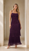Front view of model wearing the purple fringe sequin maxi dress