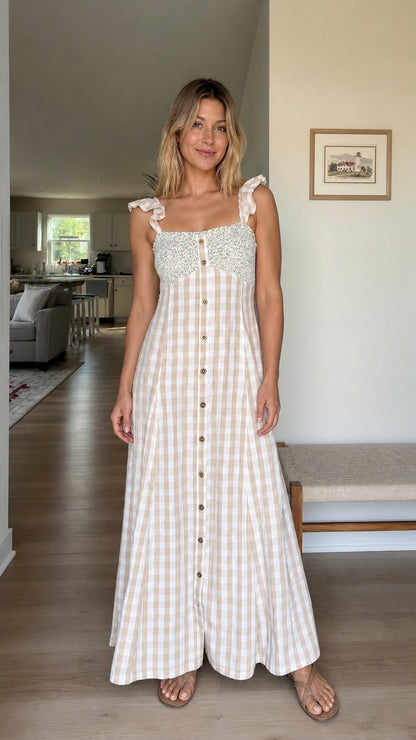 Front full view of woman wearing beige gingham maxi dress
