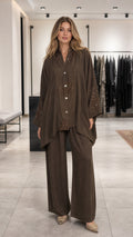 Front view of model wearing brown embroidered lounge set