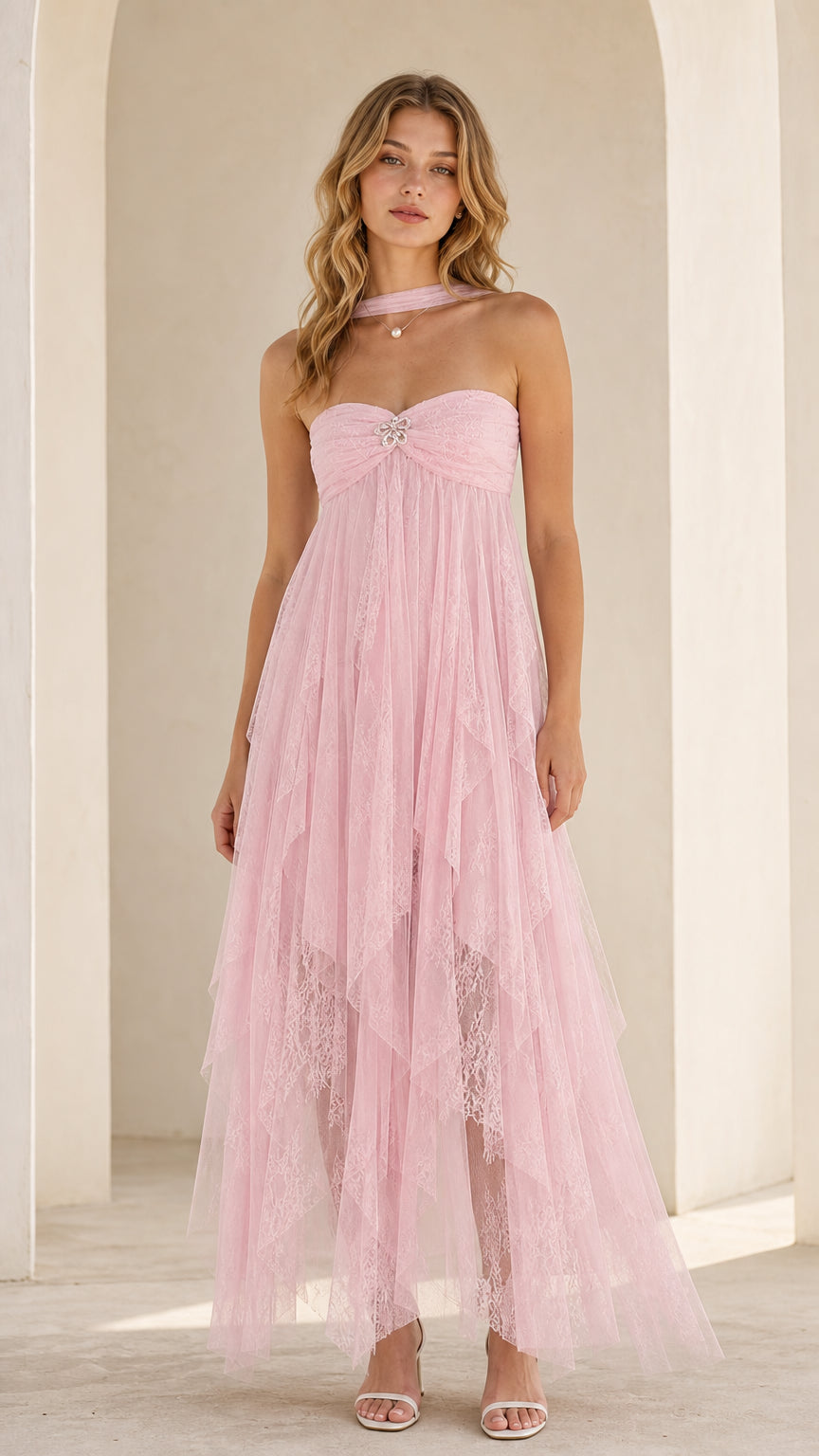 Model wearing pink strapless tulle maxi dress with choker front view
