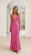 Front view of model wearing Hot Pink sequin maxi dress