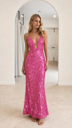 Front view of model wearing Hot Pink sequin maxi dress