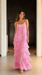 Model wearing pink tiered fringe maxi dress from the front