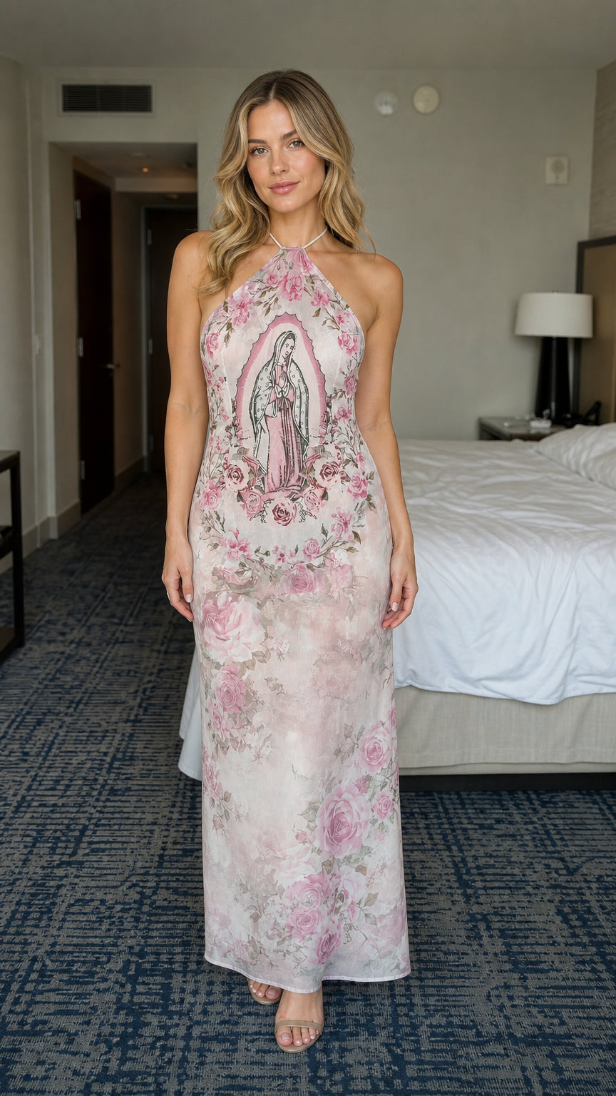 Front view of model wearing pink floral halter maxi dress