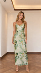 Front view of sage green floral sequin maxi dress