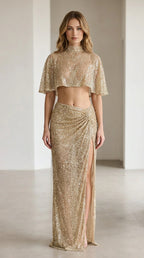 Champagne sequin crop top and ruched maxi skirt set shown from the front