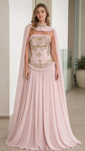 Front view of Blush Pink embroidered corset evening gown with cape