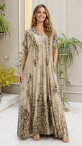 Front view of model wearing beige animal print maxi kaftan dress