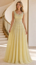 Front view of yellow beaded tulle evening gown