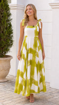 Front view of woman wearing white and green brushstroke maxi dress