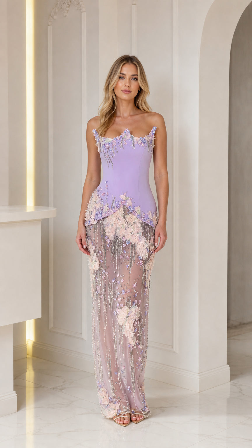 Front view of model wearing lavender embellished strapless gown