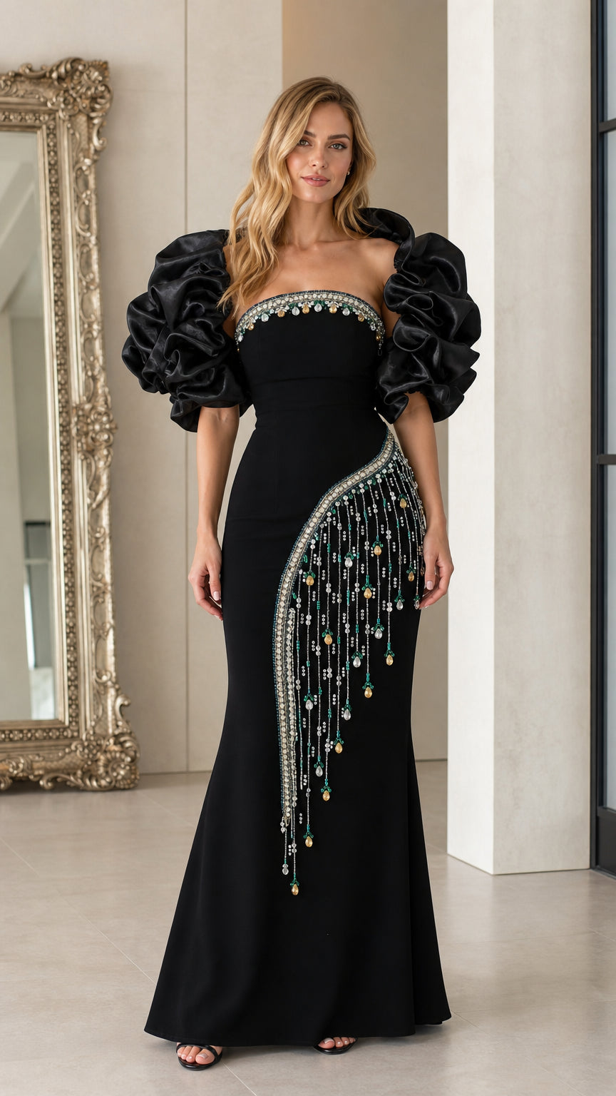 Front view of black beaded evening gown with ruffled sleeves