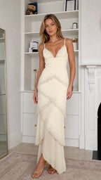 Front view of Ivory beaded tiered maxi dress on model