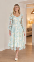 Front view of model wearing mint floral applique midi dress