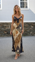 Model wearing Brown Multi patchwork slip maxi dress from the front