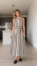 Full front view of brown and white striped halter midi dress with belt