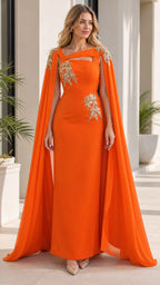 Front view of woman wearing orange evening dress with cape