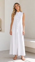 Front full view of a woman wearing a white sleeveless button-down maxi dress