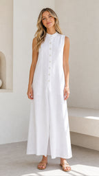 Front full view of a woman wearing a white sleeveless button-down maxi dress