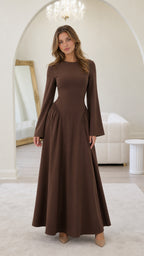 Front view of model wearing brown long-sleeve maxi dress