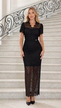 Front view of model wearing black lace maxi dress
