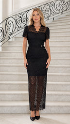 Front view of model wearing black lace maxi dress
