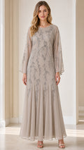 Front view of model wearing taupe sequin embroidered long sleeve maxi dress