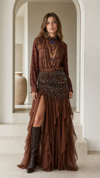 Model wearing brown boho printed blouse and tiered ruffle maxi skirt set front view