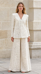 Front view of cream textured blazer and wide-leg pants set